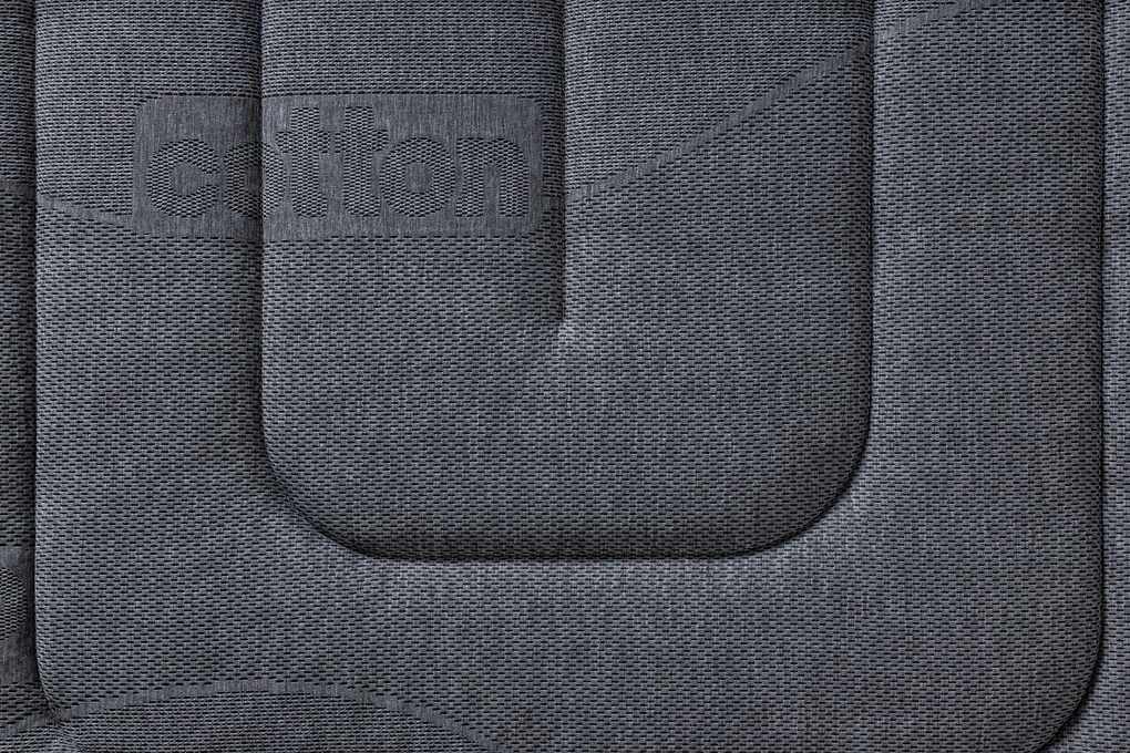 Detalle lateral gris con logo del Colchón ZEUS CHESTIA